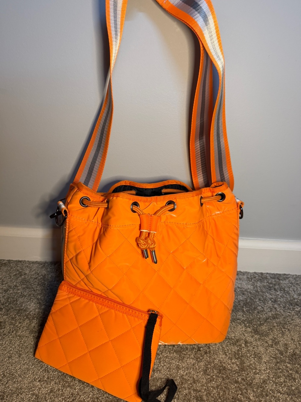 HAUTE SHORE Orange Quilted Crossbody with Striped Strap